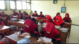 Membaca Alquran di kelas 